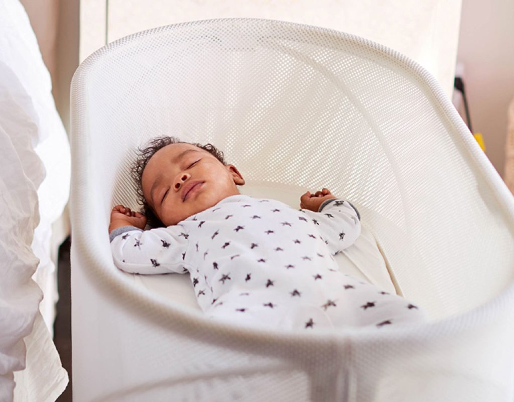 infant_in_bassinet_next_to_parents_bed